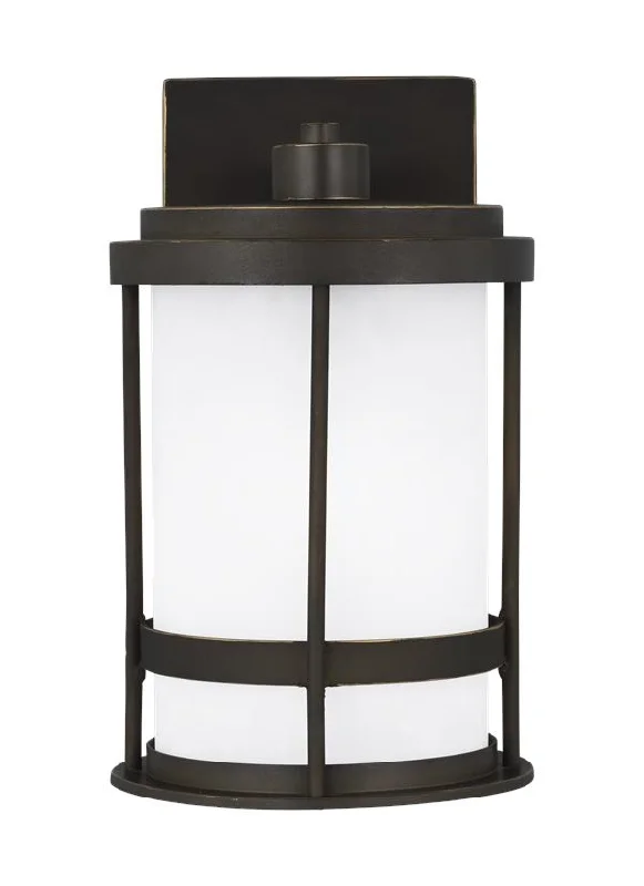 victorian style wall lamps with intricate metalwork for traditional entrywaysWilburn Collection - Small One Light Outdoor Wall Lantern | Finish: Antique Bronze - 8590901EN3-71 victorian style wall lamps with intricate metalwork for traditional entrywaysWilburn Collection - Small One Light Outdoor Wall Lantern | Finish: Antique Bronze - 8590901EN3-71