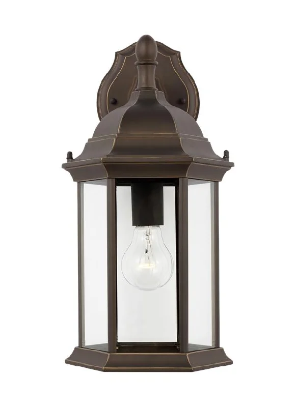 metal wall lamps with a matte black finish for a sleek and modern lookSevier Collection - Medium One Light Downlight Outdoor Wall Lantern | Finish: Antique Bronze - 8938701-71 metal wall lamps with a matte black finish for a sleek and modern lookSevier Collection - Medium One Light Downlight Outdoor Wall Lantern | Finish: Antique Bronze - 8938701-71