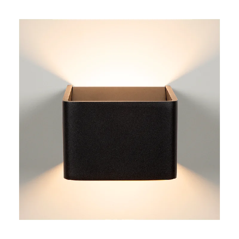 wood wall lamps with natural grain for a warm and organic feelWall light Calla | black