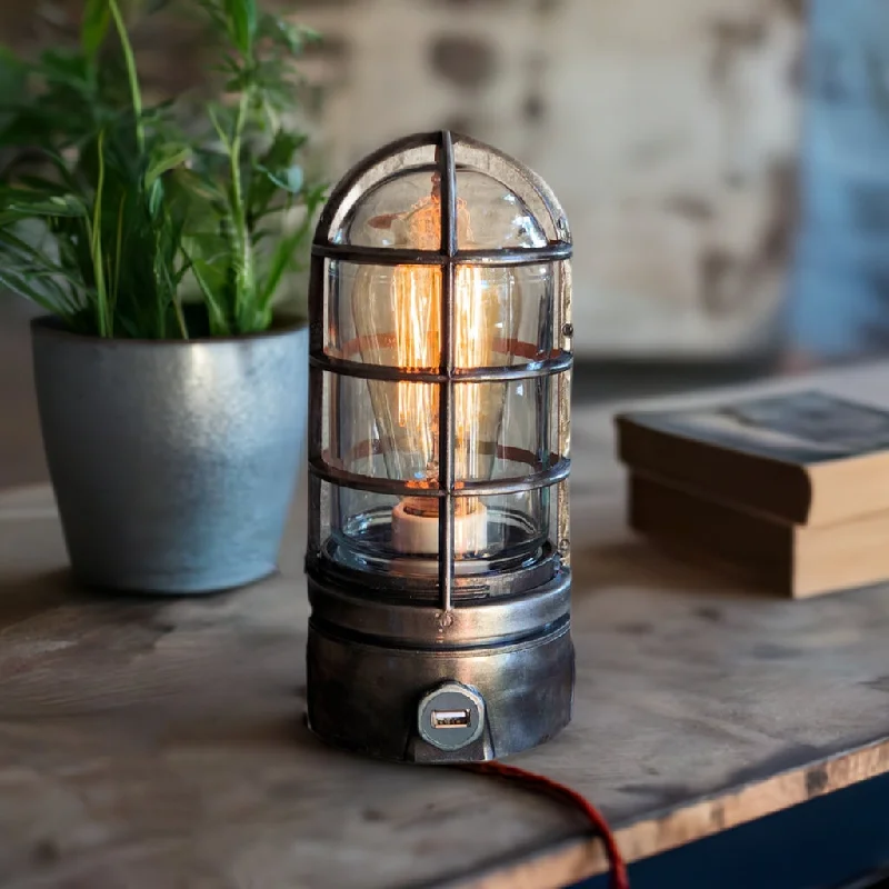 Dust - Resistant Industrial Lighting for Dirty WorkspacesIndustrial Edison Lamp - The Iron Cage Dust - Resistant Industrial Lighting for Dirty WorkspacesIndustrial Edison Lamp - The Iron Cage