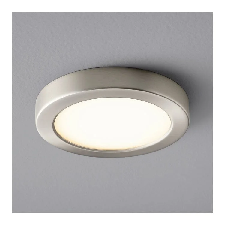 Recessed lights with a narrow beam spread for spotlighting artworksElite Single-Light 7" LED Flush Mount Ceiling Fixture - Satin Nickel Recessed lights with a narrow beam spread for spotlighting artworksElite Single-Light 7" LED Flush Mount Ceiling Fixture - Satin Nickel