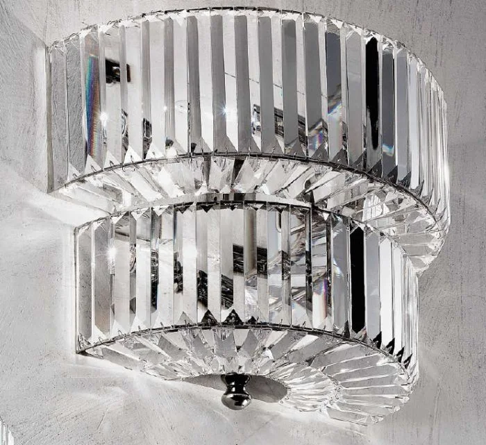 coastal style wall lamps with nautical elements for beachfront homesDouble Wall Light In Polished Nickel With Crystal Decoration