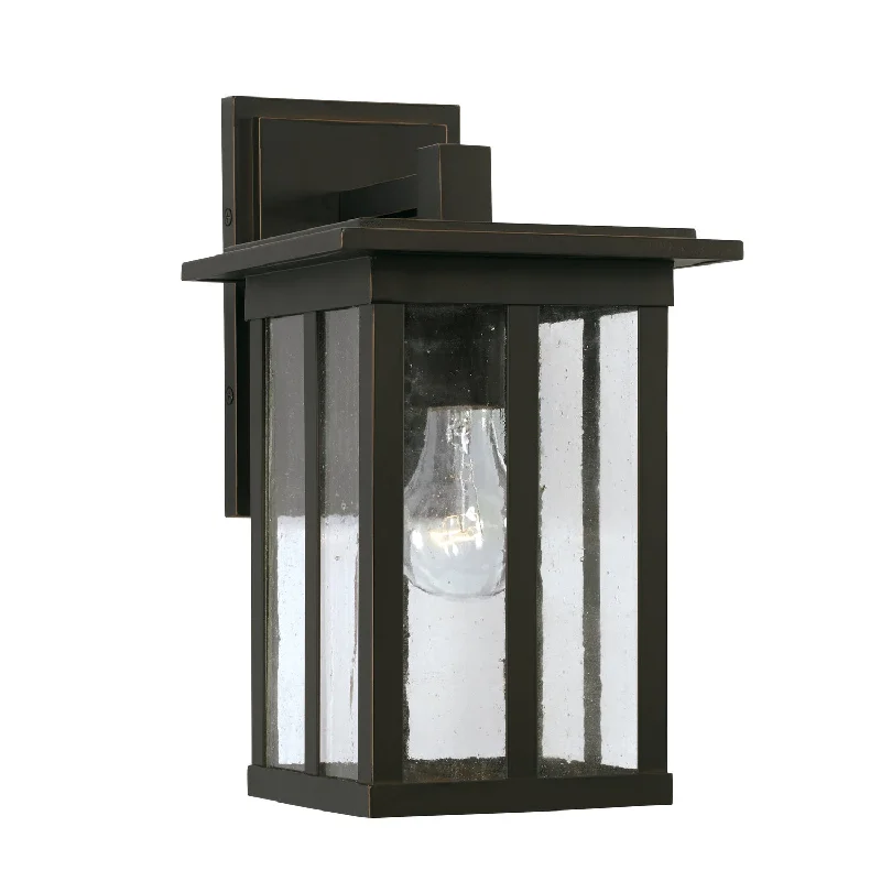 Recessed lights with a narrow beam spread for spotlighting artworksBarrett 1-Light Outdoor Wall Lantern in Oiled Bronze Recessed lights with a narrow beam spread for spotlighting artworksBarrett 1-Light Outdoor Wall Lantern in Oiled Bronze