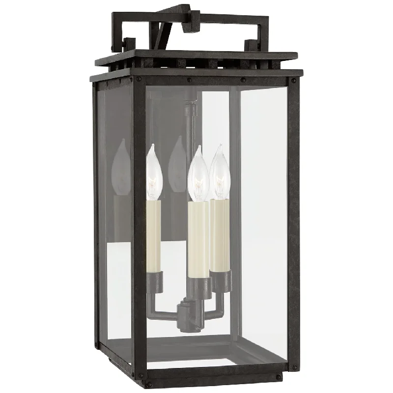 metal wall lamps with a matte black finish for a sleek and modern lookCheshire 3-Light Wall Lantern metal wall lamps with a matte black finish for a sleek and modern lookCheshire 3-Light Wall Lantern
