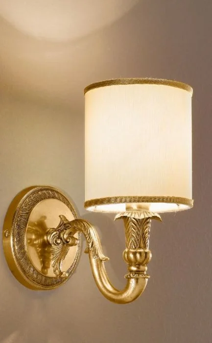 gothic style wall lamps with dark finishes for a mysterious libraryAntique French Gold Finish Wall Light