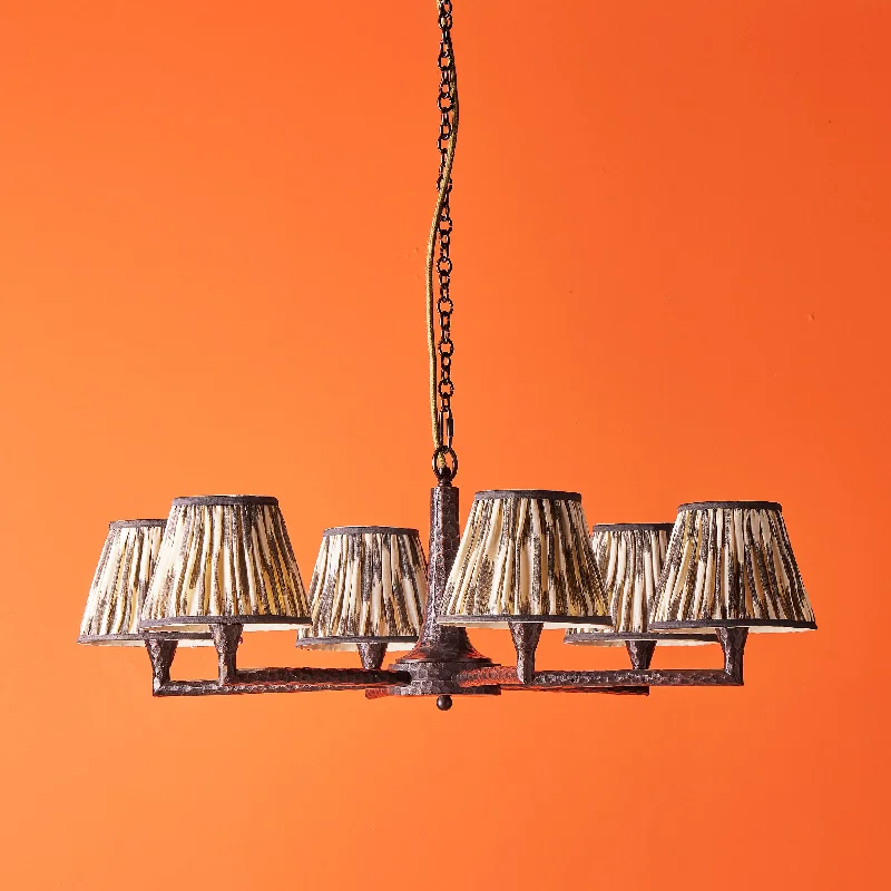 Small Chandeliers for Compact RoomsFrinky chandelier in hammered bronze