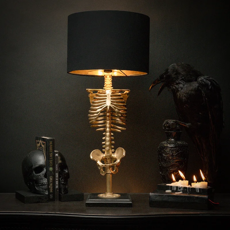 industrial style table lamps with exposed bulbs for loft apartmentsThe Skeleton Lamp Gold Edition by The Blackened Teeth