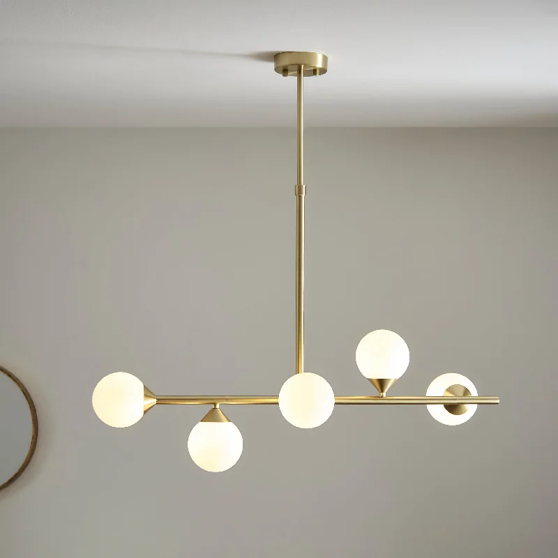African - Inspired Ceiling Lights with Tribal Patterns and Natural MaterialsAmos Crib Pendant Bar Brushed Brass African - Inspired Ceiling Lights with Tribal Patterns and Natural MaterialsAmos Crib Pendant Bar Brushed Brass