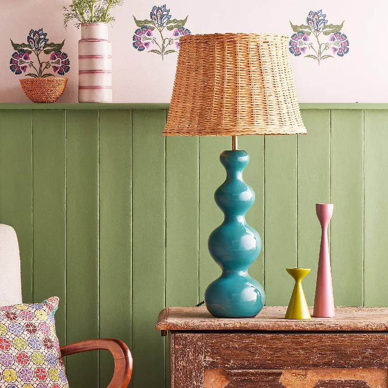 leather table lamps with a distressed texture for a rugged charmSmaller Wobster table lamp in turquoise lacquered wood